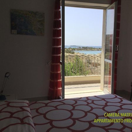 Вілла Bilocali Approdo "Fronte Mare" E "Lato Strada" Порто-Чезарео Екстер'єр фото